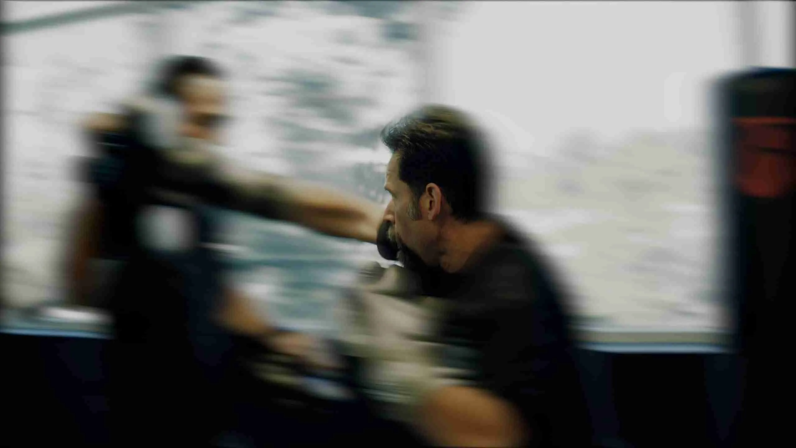 Athletic people doing crossfit training in gym as warm up to krav maga and brazillian jiu jitsu