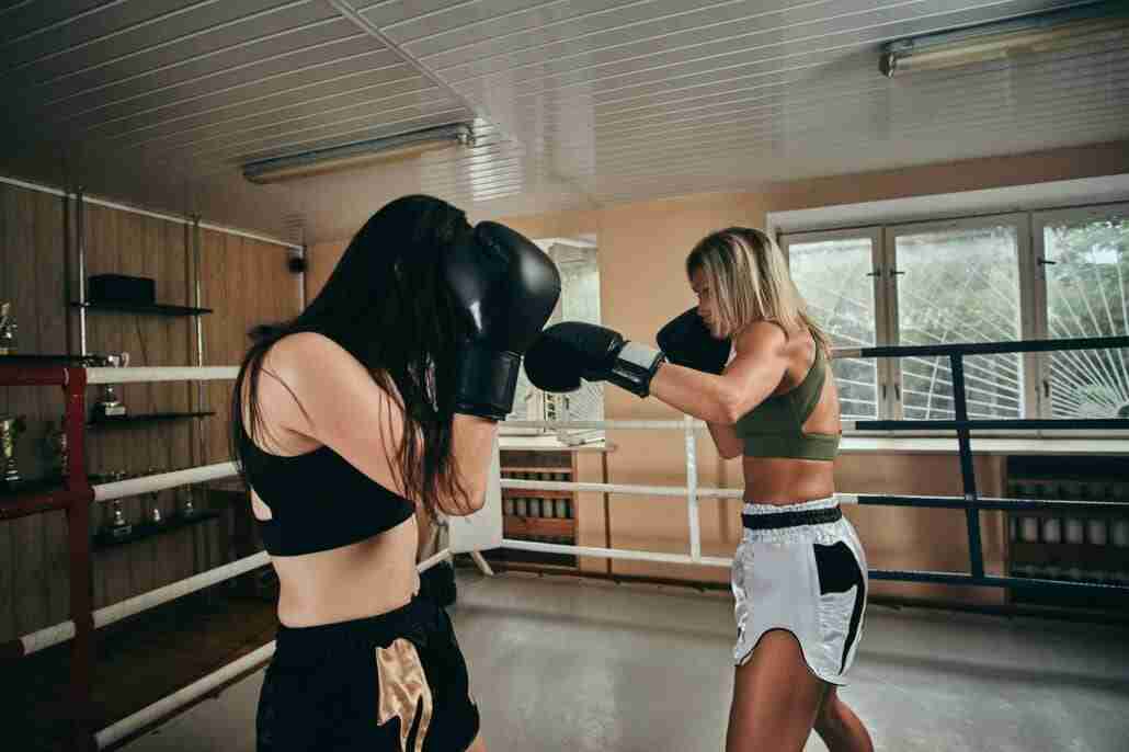 Krav Maga Coach and her new trainee have a sparring preparing for the belt test.