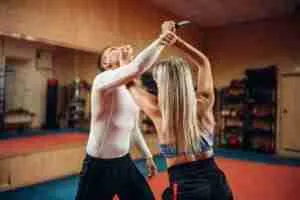Woman Makes Punch To The Throat, Self Defense